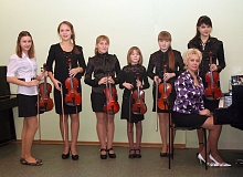 Ансамбль скрипачей